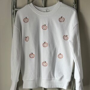 Maurices Women’s Size XS White Crewneck Sweatshirt with Orange Pumpkin Motif